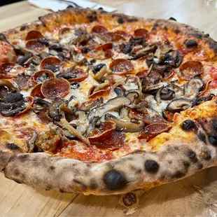 Pepperoni and mushroom pizza