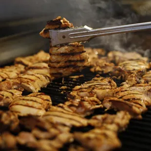 a person using tongs