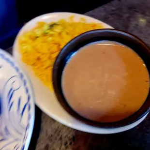 a cup of coffee and a plate of food