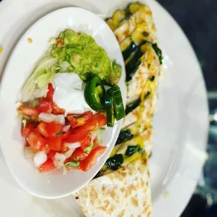 I love their savory spinach and mushroom quesadillas .