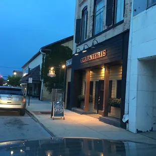 a car parked in front of a restaurant