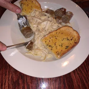 Fettuccine with Italian sausages.