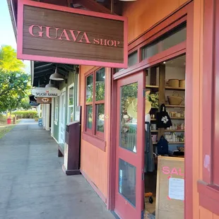 Outside. Guava colored building.