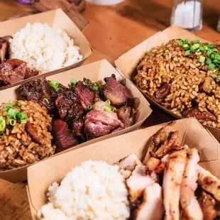 From top left corner clockwise: Smoked Pork Bowl, Smoked Fried Rice, Smoked Boneless Chicken, and our Smoked Kalbi Bowl.