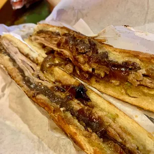 Pernil roasted pork and onions. $12.50. Maybe a smidge more mayo would be desired. Tasty.