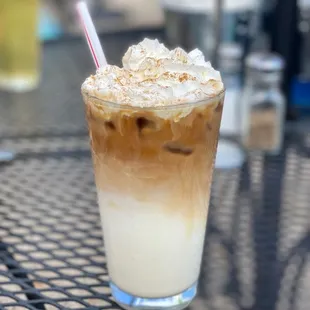 a cold beverage with a straw