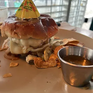 Double cheese burger with a dip made with garlic and onions