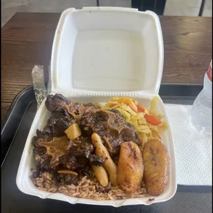 Ox tail plate with cabbage and plantain.