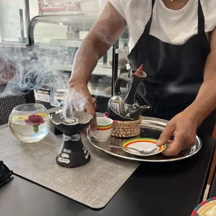 We had the "Ethiopian Coffee", dark expresso like coffee with incense and snacks.