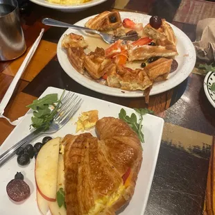 Waffle and egg sandwich and grits