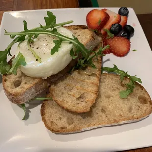 one poached egg with toast