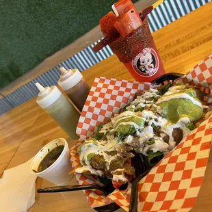 Loaded Birria nachos and watermelon Agua "locas"