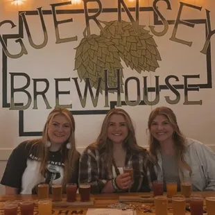 three women sitting at a table