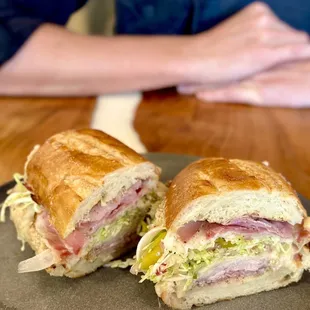 a sandwich cut in half on a plate