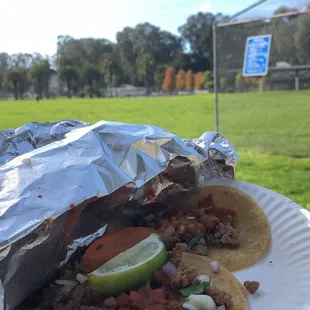 Three regular carne asada tacos