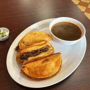 a plate of food and a cup of coffee