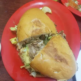 Torta de carnitas hands down. I also had tacos of lengua. This place is amazing. I totally recommend it.