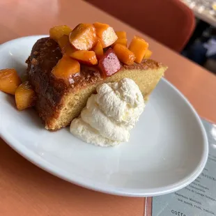 Olive oil cake with peaches: savory sweet, very unique flavor. We loved it.
