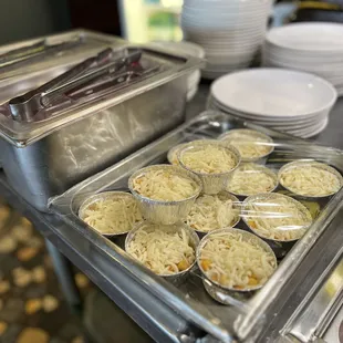 trays of food being prepared