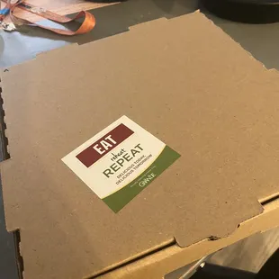 a pizza box on a table
