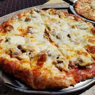 Pepperoni, Sausage, Mushroom and Extra Cheese Chicago Style Pizza. Simply the best!