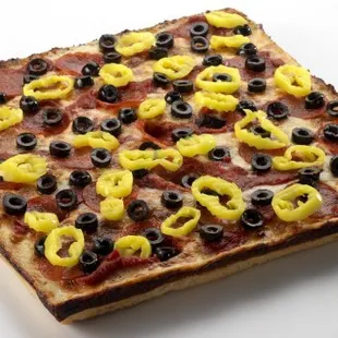 Deep Dish Pizza with pepperoni, olives &amp; peppers