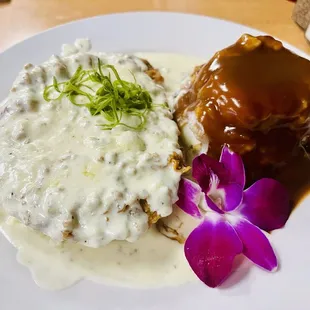 Chicken fried steak with mashed potatoes and loads of gravy on both sides