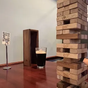 a stack of wooden blocks on a table