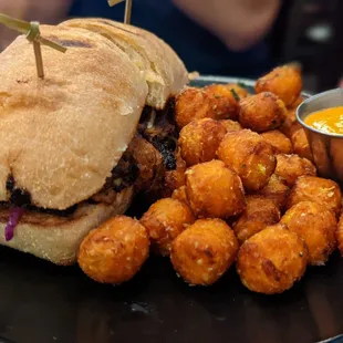 Pulled pork sandwich with sweet potato tater tots upgrade