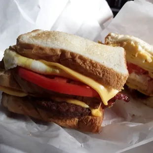 Bacon, sausage, egg, cheese triple stacked. Double egg, double cheese, tomato, and mayo