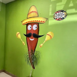 a hot dog with a hat and mustache