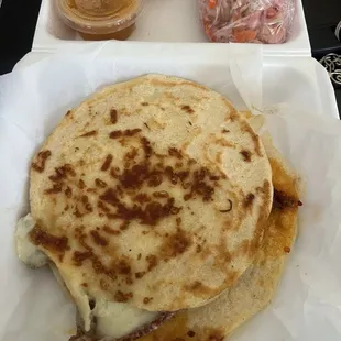 Top is cheese pupusa and the bottom was one of their pupusas especiales (chorizo and cheese)