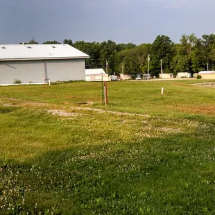 Bathhouse and large garbage container.