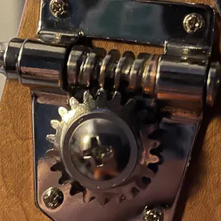 Stripped tuning gear. Teeth don't go into the grooves. Will just skip and go out of tune when tuned too tight.