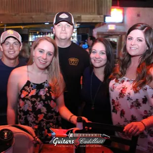 Make it a friends night out at Guitars and Cadillacs Fort Worth!