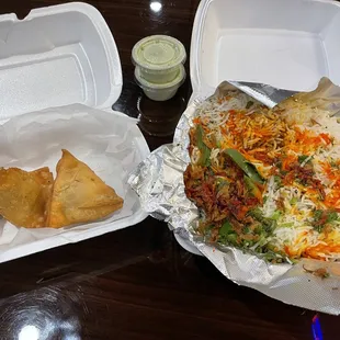 Samosas and chicken biryani