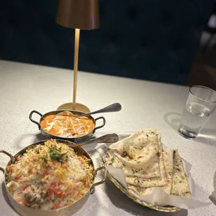 Butter chicken, Garlic naan, Lamb Biryani