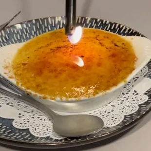 Crème Brûlée flambée Grand Marnier. A must to try !