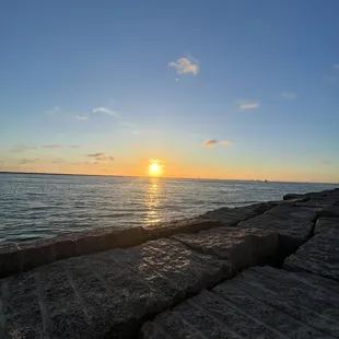 Jetty great place to watch the sun come up! And ships and dolphins!