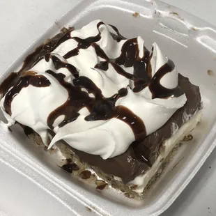 a dessert in a styrofoam container