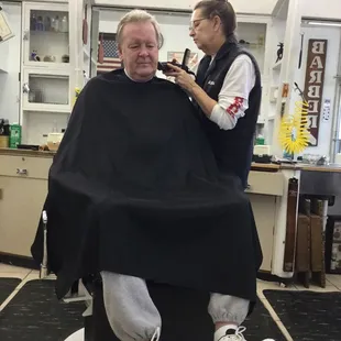 Miss Althea is working at GULFWAY Barber shop she has been doing men's haircuts in Corpus Christi sense 1994