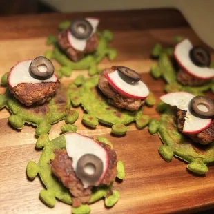 Gilawati kebab, royally seated on a palak flaky parantha.