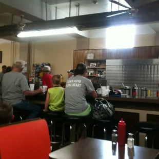 a group of people in a restaurant