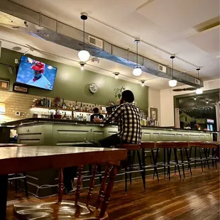 a man sitting at a bar