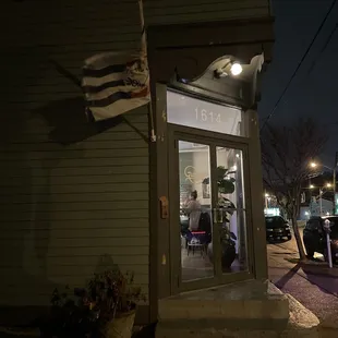 a flag flying outside of a building