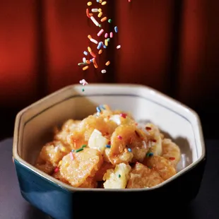 a bowl of food with sprinkles