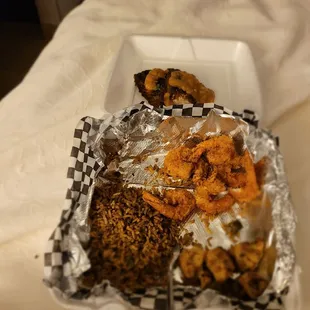 a tray of food on a bed