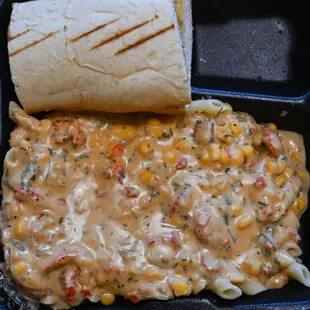 Maque  Choux  over pasta.