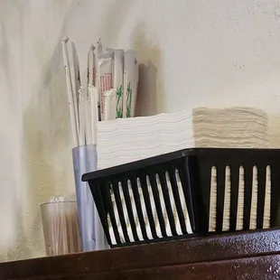 a close up of a comb on a shelf