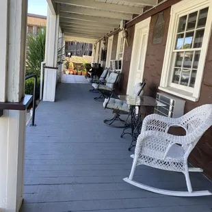 Front porch. Love the outdoor seating.
